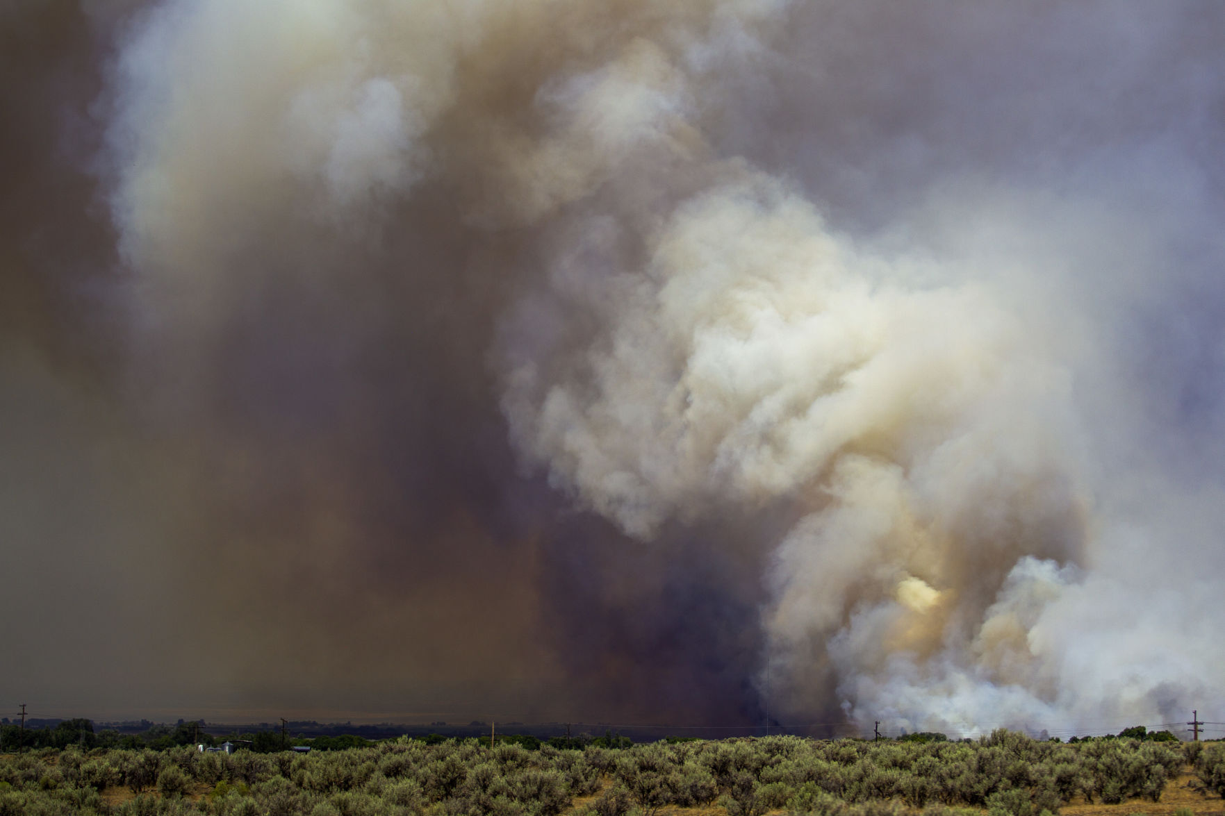 Drops Fire spreads more than 2,000 acres